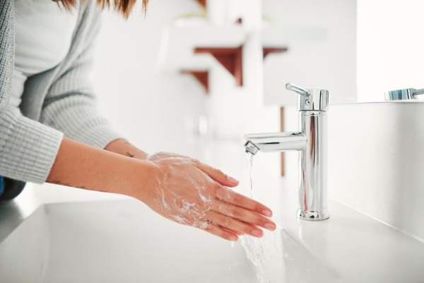 woman washing her hands
